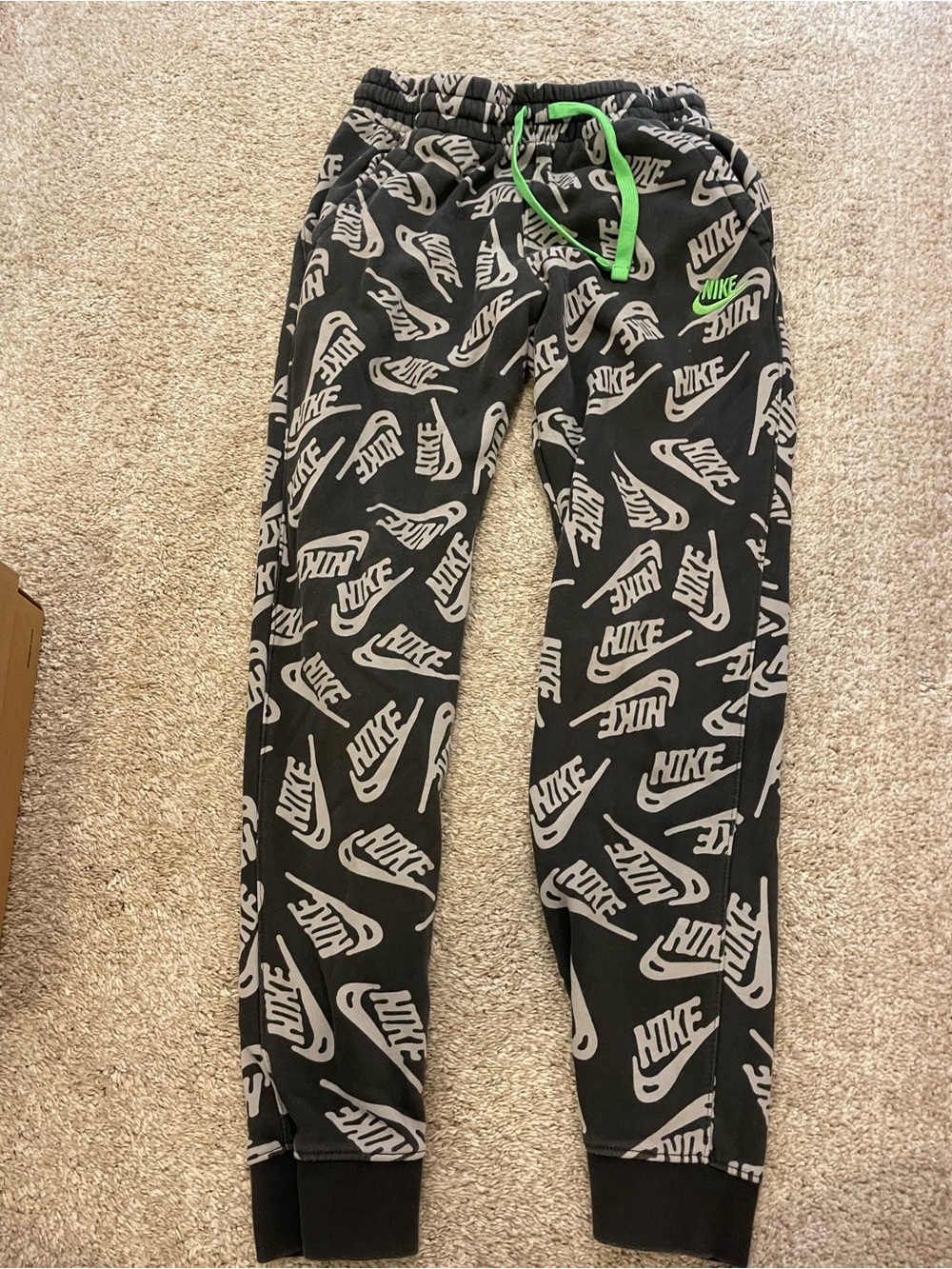 Nike Black Joggers with Allover White Logo and Green Drawcord